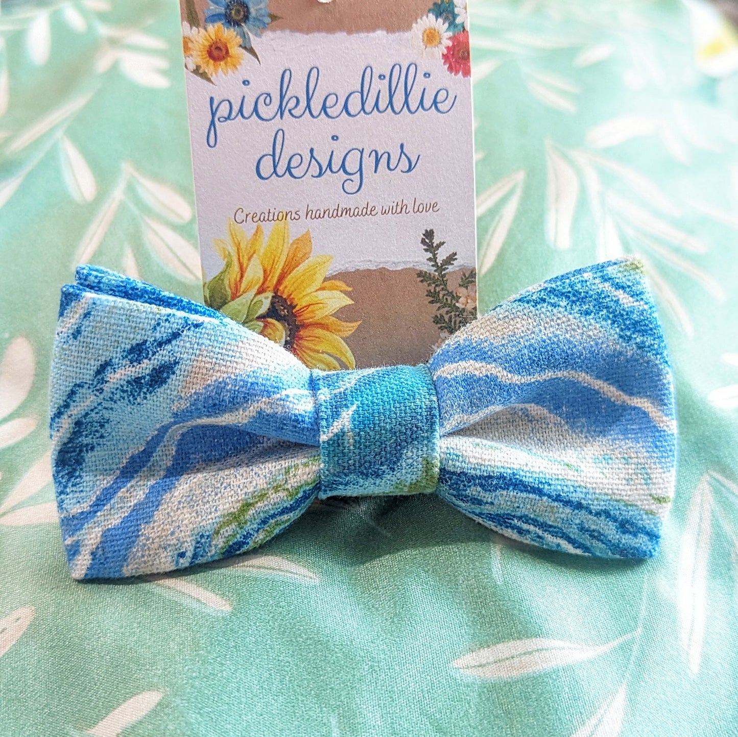 Discover handsewn dog bowties made in Annapolis, Maryland by Pickledillie Designs. Elevate your pet's style with unique cloth pet fashion accessories. Shop small and support local artisans.
