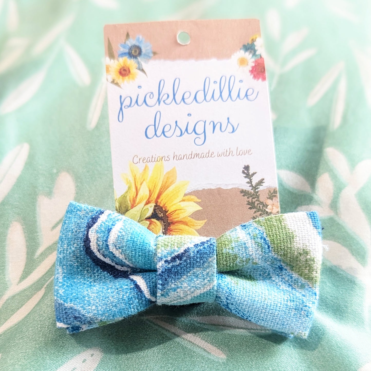 Discover handsewn dog bowties made in Annapolis, Maryland by Pickledillie Designs. Elevate your pet's style with unique cloth pet fashion accessories. Shop small and support local artisans.
